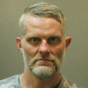 Photo of David Savard with camouflage shirt