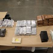 52 bricks of drugs located inside the duffle bags