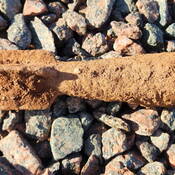 photo of possible explosive ordnance found in PEI field