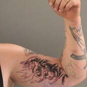 Photo of tattoos on Johnny James Timothy Boys’ left arm