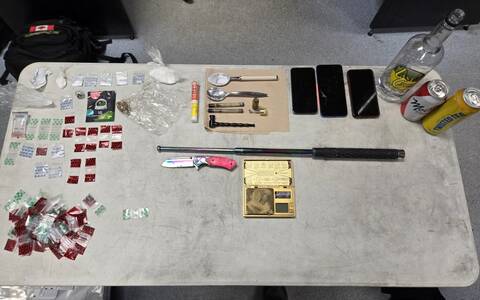 A table with the seized items following the seatbelt traffic stop