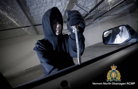 graphic of person breaking into a vehicle