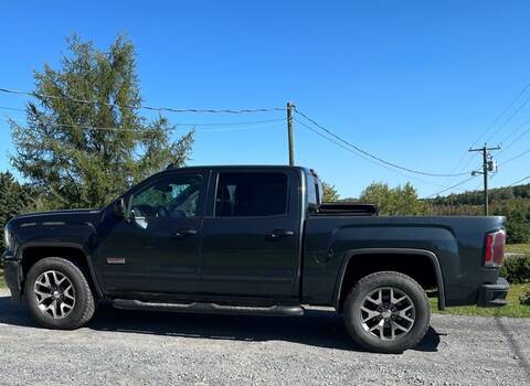 Stolen navy blue 2018 GMC Sierra pickup truck from Plaster Rock, New Brunswick