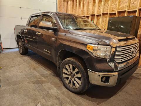 A grey 2017 Toyota Tundra parked in a garage