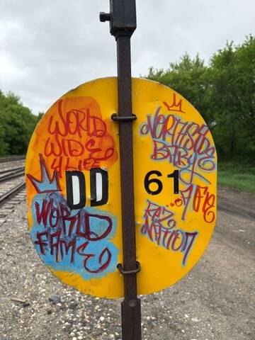 Dauphin RCMP arrested a male on June 4 after seeing him spray paint graffiti onto a yellow railhead sign. He's been charged with mischief.