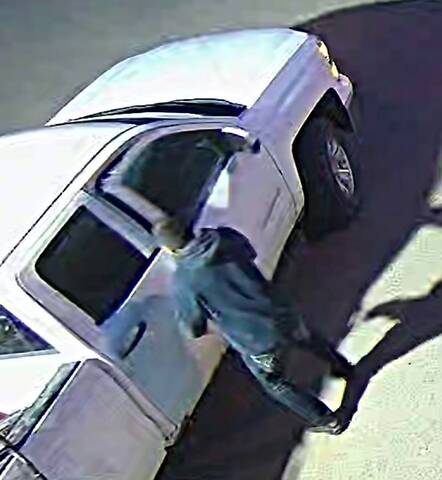 Suspect and white GMC truck sought by Portage la Prairie RCMP in relation to a June 2025 break and enter in Macgregor, Manitoba.