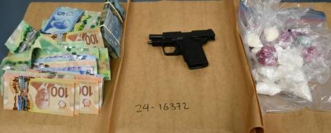 Drugs and prohibited firearm seized in warrant execution