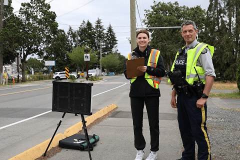 Cst. John Varley of West Shore RCMP Community & Indigenous Policing Unit with a Speed Watch Volunteer