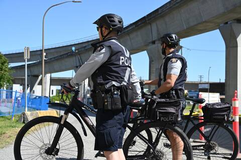 Richmond RCMP officers on bikes outside