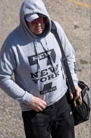 Surveillance image of armed robbery suspect at Blackfalds Motor Inn