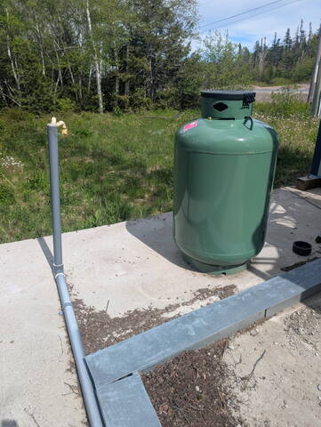 Damaged propane tank at communications tower near Lethbridge, Newfoundland and Labrador