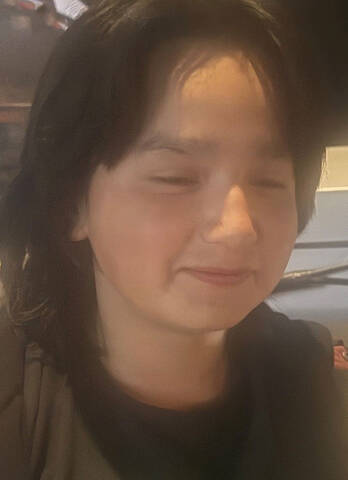 Photo of missing 14-year-old boy, Destin Ratt, with brown eyes and short brown hair.