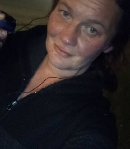 Missing person Alissa Paige Arnold in a black zip-up shirt