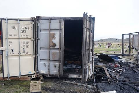 Fire damage to shack and nearby sea can in the West 40 area of Iqaluit