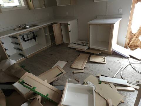 Broken cupboards in kitchen