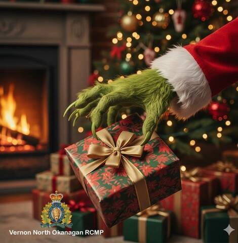 photo of grinch hand taking a present