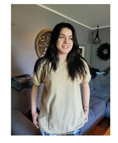 Thumbnail: Image of missing youth with long dark hair.
