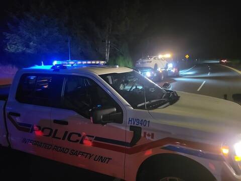 Two vehicles are towed, while a BC Highway Patrol- Integrated Road Safety Unit supervises, after their drivers failed Mandatory Alcohol Screening