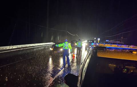 A BC Highway Patrol check stop with police officers stopping drivers to check for impairment