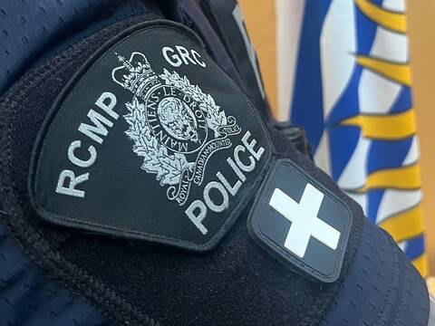 Close-up of RCMP-GRC patch and medic patch on officer’s arm