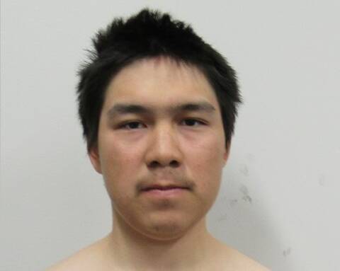 Wanted photo of Norman Natanine, 25, subject of Nunavut-wide warrants