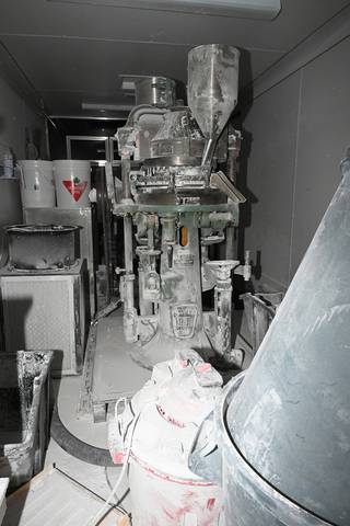 A pill press for large-scale production of suspected methamphetamine.