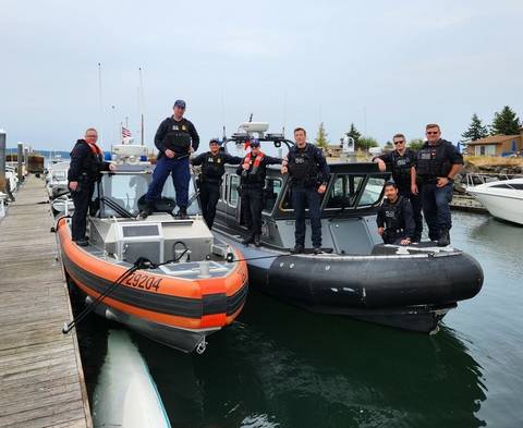 Photo of RCMP Federal Policing – Pacific Region Shiprider team along side U.S. Coast Guard Ship rider team