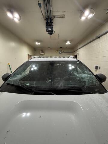Sandy Bay RCMP damaged vehicle showcasing the smashed front windshield