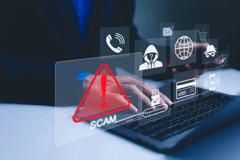 “A generic image of someone sending scam messages globally to people via phone or the internet”