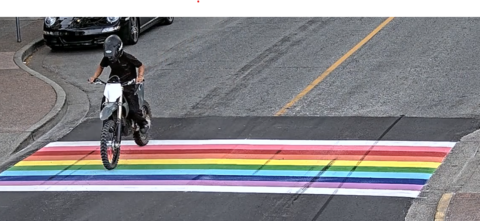 Electric Dirt bike on the crosswalk