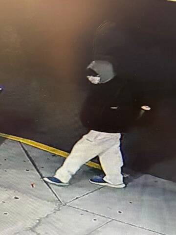 Suspect walking outside Country Grocer