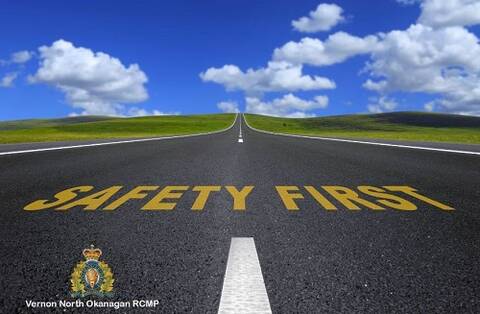 Stock image of blue sky and road with Safety First in yellow letters