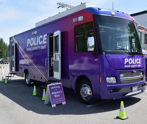 Alexa's Bus with Police Road Safety Unit printed on the side and on the hood