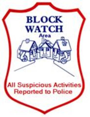Block Watch Area sign that says all suspicious activities reported to police