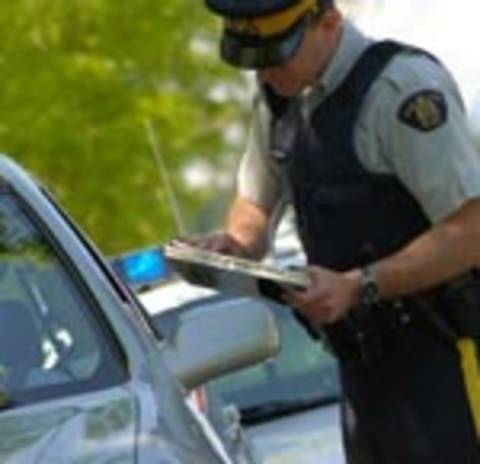 A police impersonator with flashing lights pulled over a woman. They asked her to step out of her car and hand over her identification.