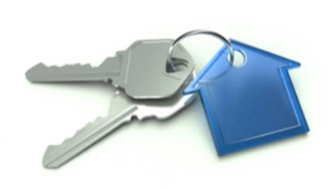 two keys and a house keychain