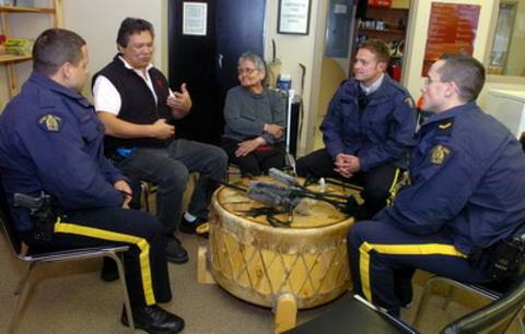 members of the Downtown Safety Unit speaking with local First Nations elders
