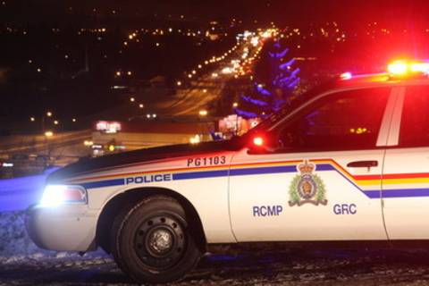 a marked police car overlooking part of the city