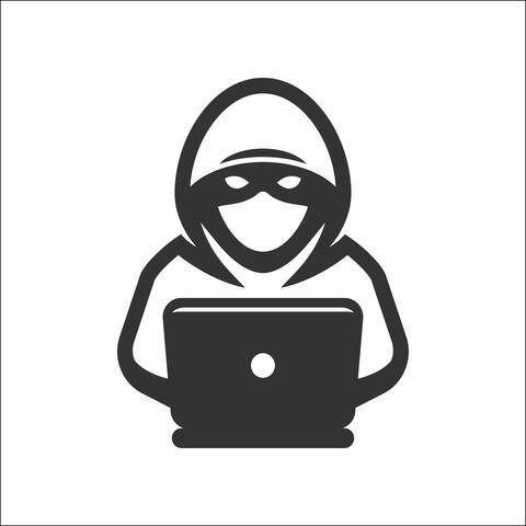 Cartoon image of a bad guy typing on a laptop.