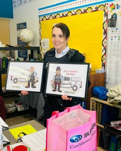 Supt. McAndie presenting plaques